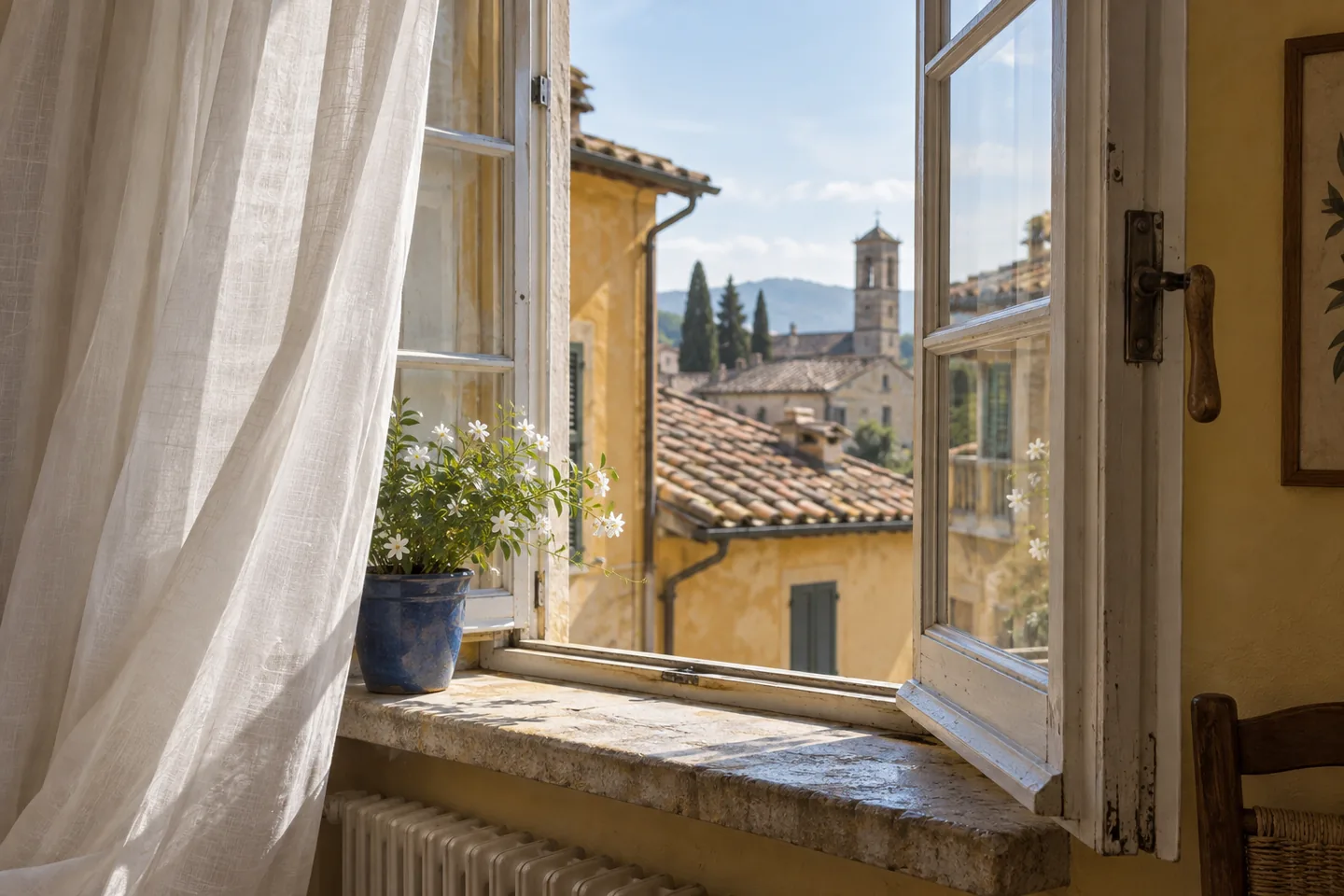 An open wooden casement window with a pale curtain and cobalt flowerpot, without anyone touching it